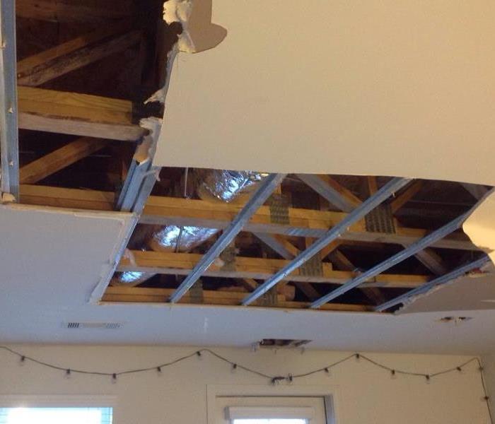 Ceiling being repaired after pipe broke